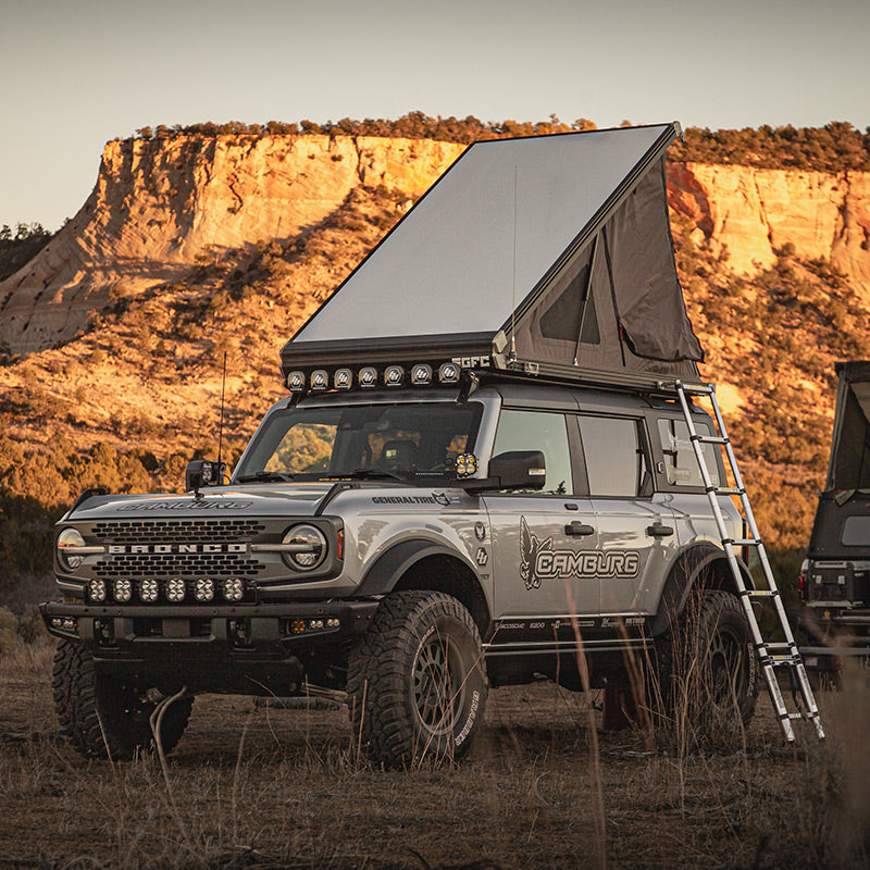 Modified Ford Bronco with aftermarket suspension and off-road accessories
